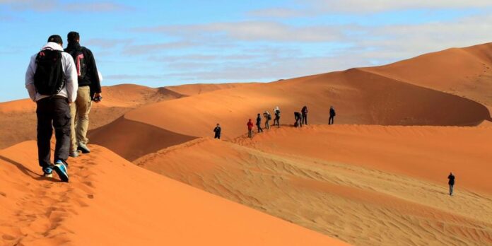 Tourists in the Namibian desert